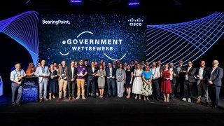 Gruppenfoto von Tag 2 des eGovernment-Wettbewerbs von BearingPoint in Berlin.